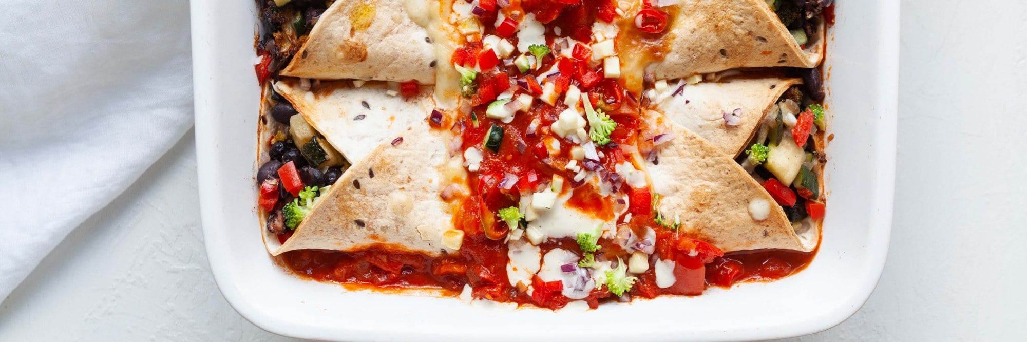 Enchilada's met zwarte bonen, courgette en tomaat (grootkeukenrecept)